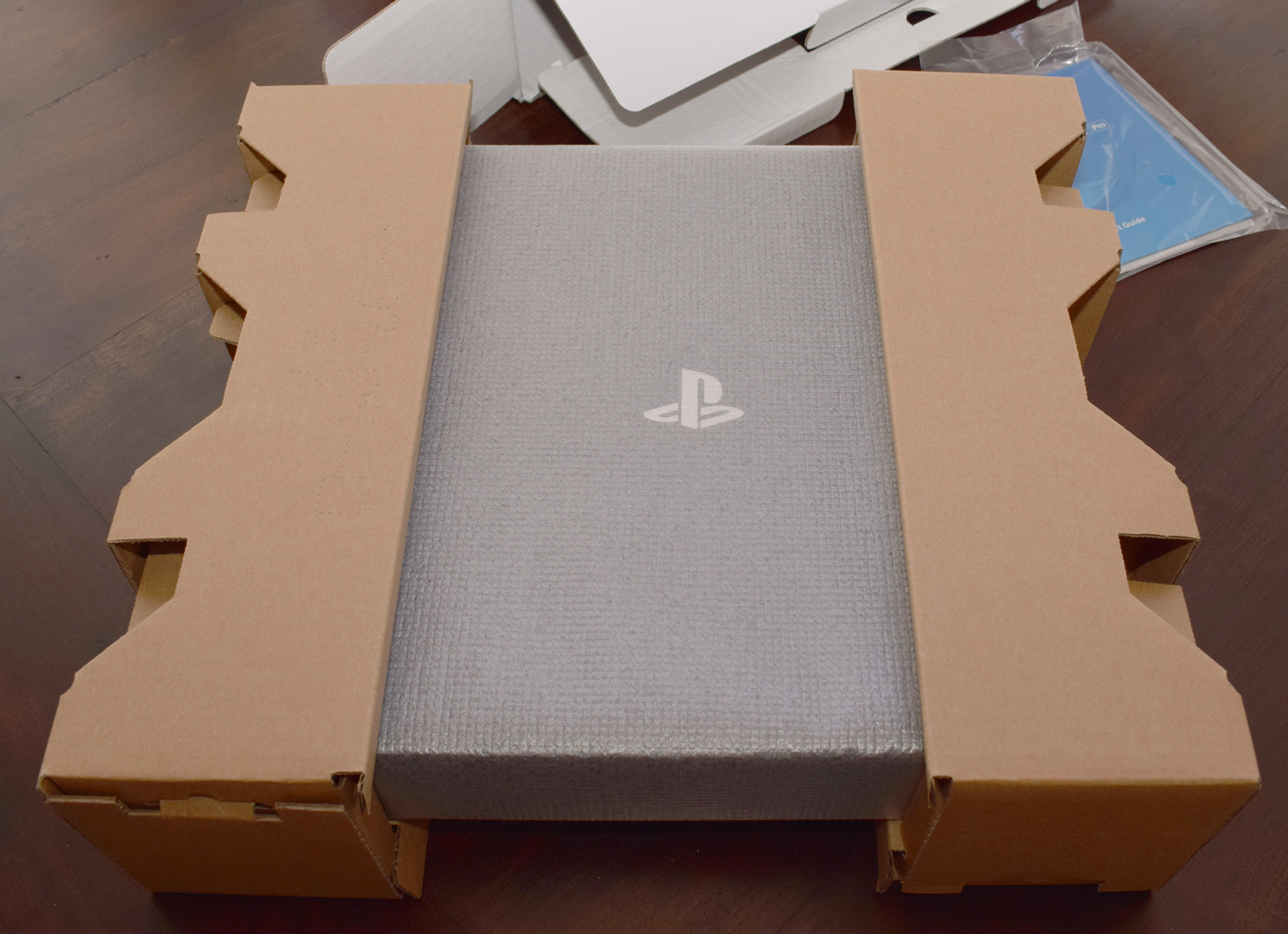 PS4 Pro Unboxing - Console in cardboard frame